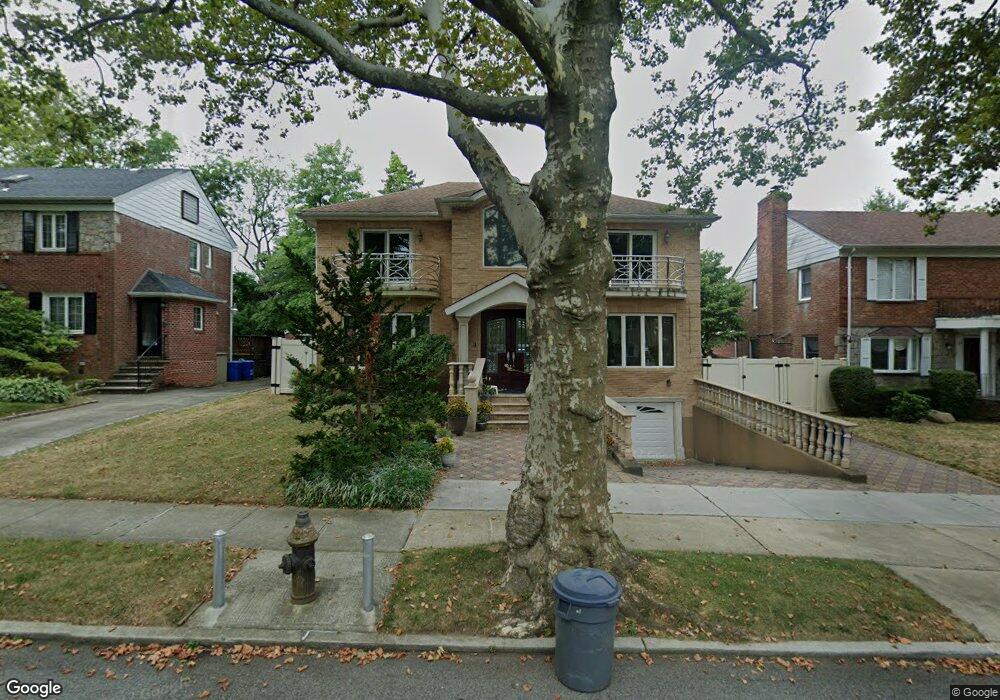 8214 192nd St, Hollis, NY 11423 - photo 1