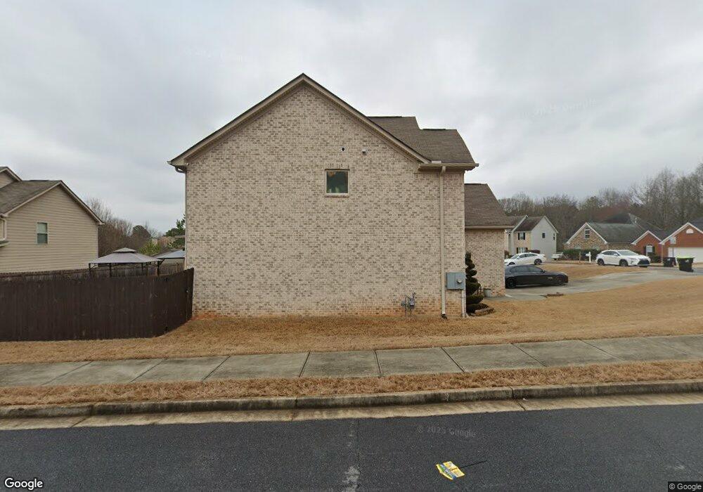 4051 Village Crossing Cir, Ellenwood, GA 30294 - photo 1