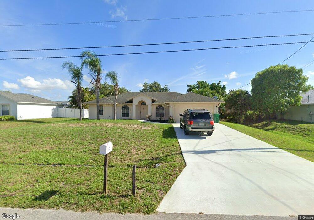 909 SW Idol Ave, Port Saint Lucie, FL 34953 - photo 1