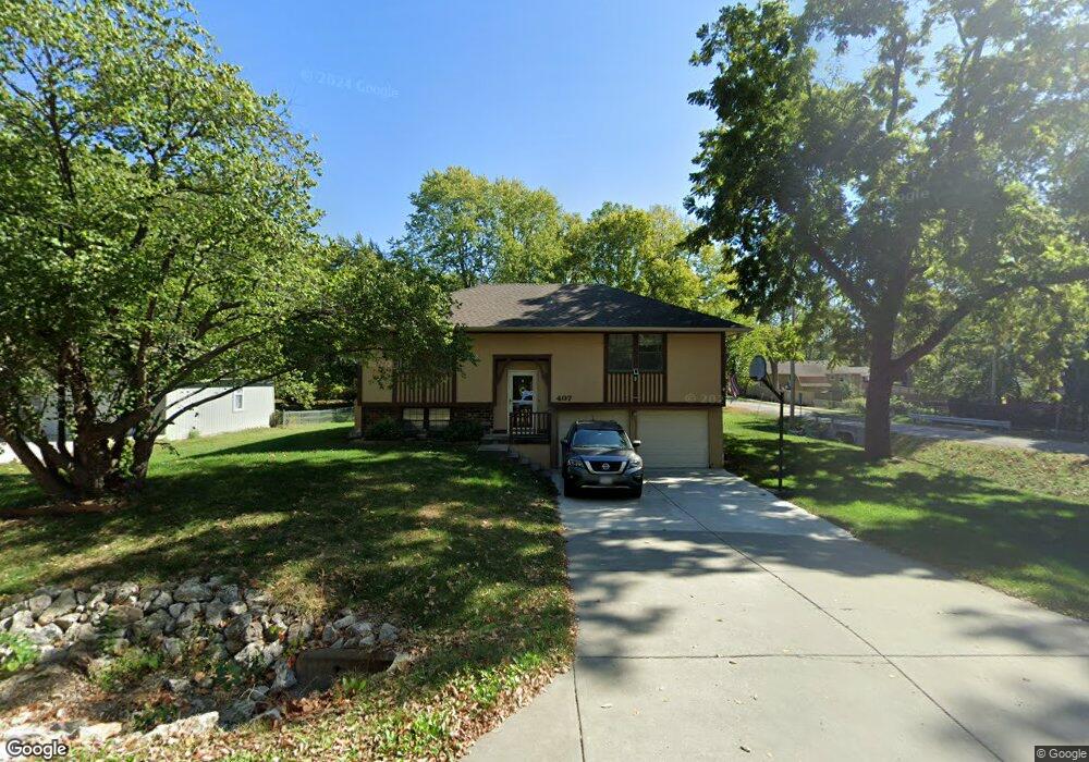 407 S Jefferson St, Raymore, MO 64083 - photo 1