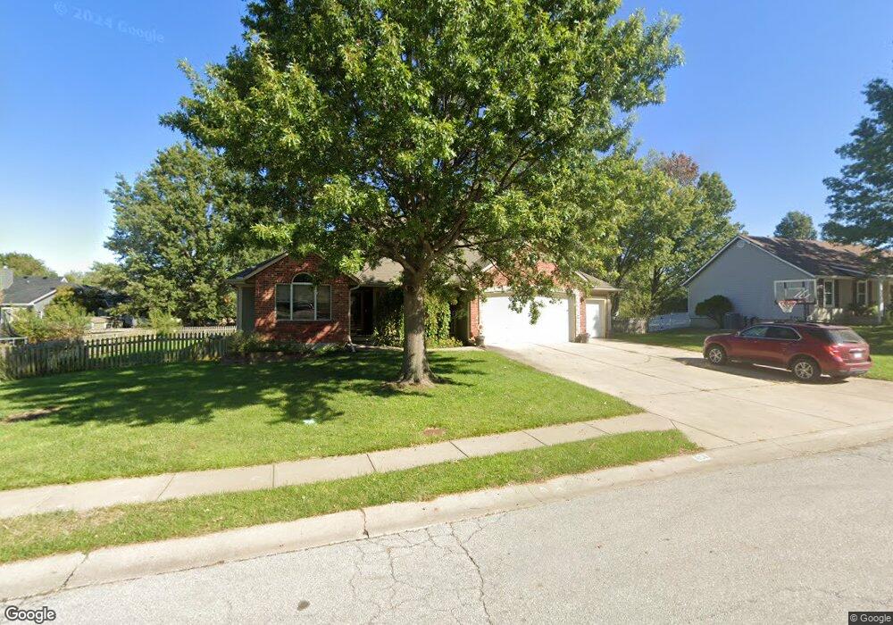 606 Cedar Dr, Raymore, MO 64083 - photo 1