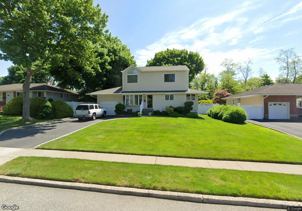 69 Marie Crescent, ComMacK, NY 11725 - photo 1