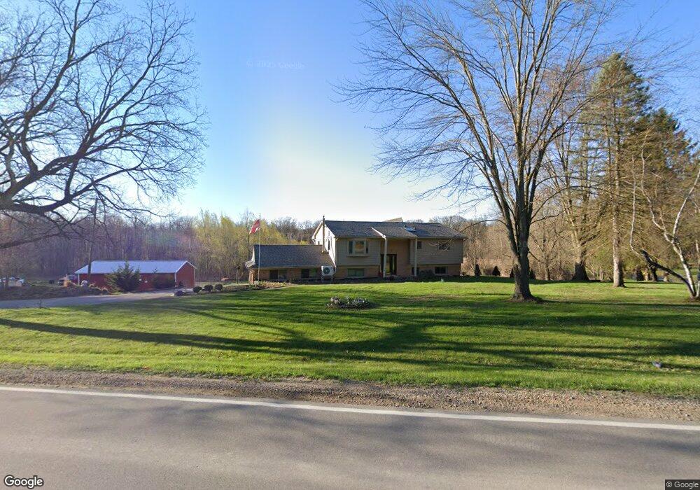 499 S Hacker Rd, Brighton, MI 48114 - photo 1