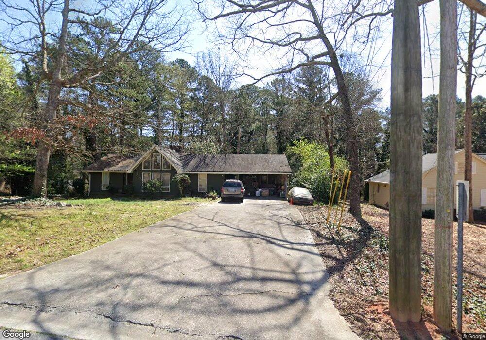 3214 Kimberly Woods Ct SW, Lilburn, GA 30047 - photo 1