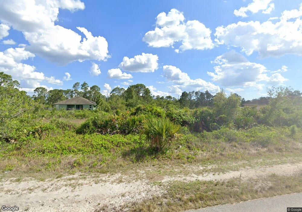 1048 Peach St, Lehigh Acres, FL 33974 - photo 1