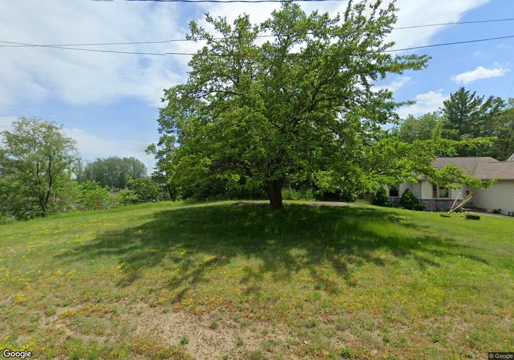 319 W Dwight St, Oscoda, MI 48750 - photo 1